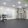 Large fitness center with plenty of equipment 